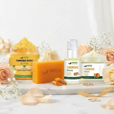 Amvital Turmeric skincare products including scrub, serum, and cream on a white surface with flowers.
