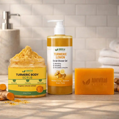 AMVital Turmeric body scrub, shower gel, and soap on a bathroom counter.
