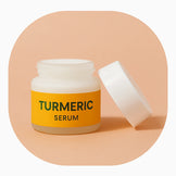 AMVital Turmeric Serum jar with open lid – brightening and hydrating skincare with natural turmeric extract