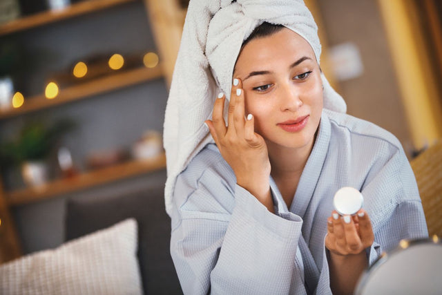 The woman is using an effective skincare from AMVital.