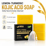 AMVital Natural Lemon-Turmeric Kojic Acid Soap 3 bar set, featuring two yellow soap bars, a black box, and a white mesh drawstring bag on a white background with gold accents.