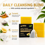 AMVital Natural Lemon-Turmeric Kojic Acid Soap bar set with two yellow soap bars, one black box, and a white drawstring sachet, surrounded by ingredient illustrations and text on a white background.
