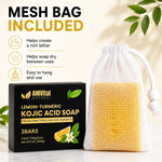 AMVital Natural Lemon-Turmeric Kojic Acid Soap bar set with a black retail box and a white mesh soap bag containing yellow soap, on a light beige background with informational text and leaf graphics.