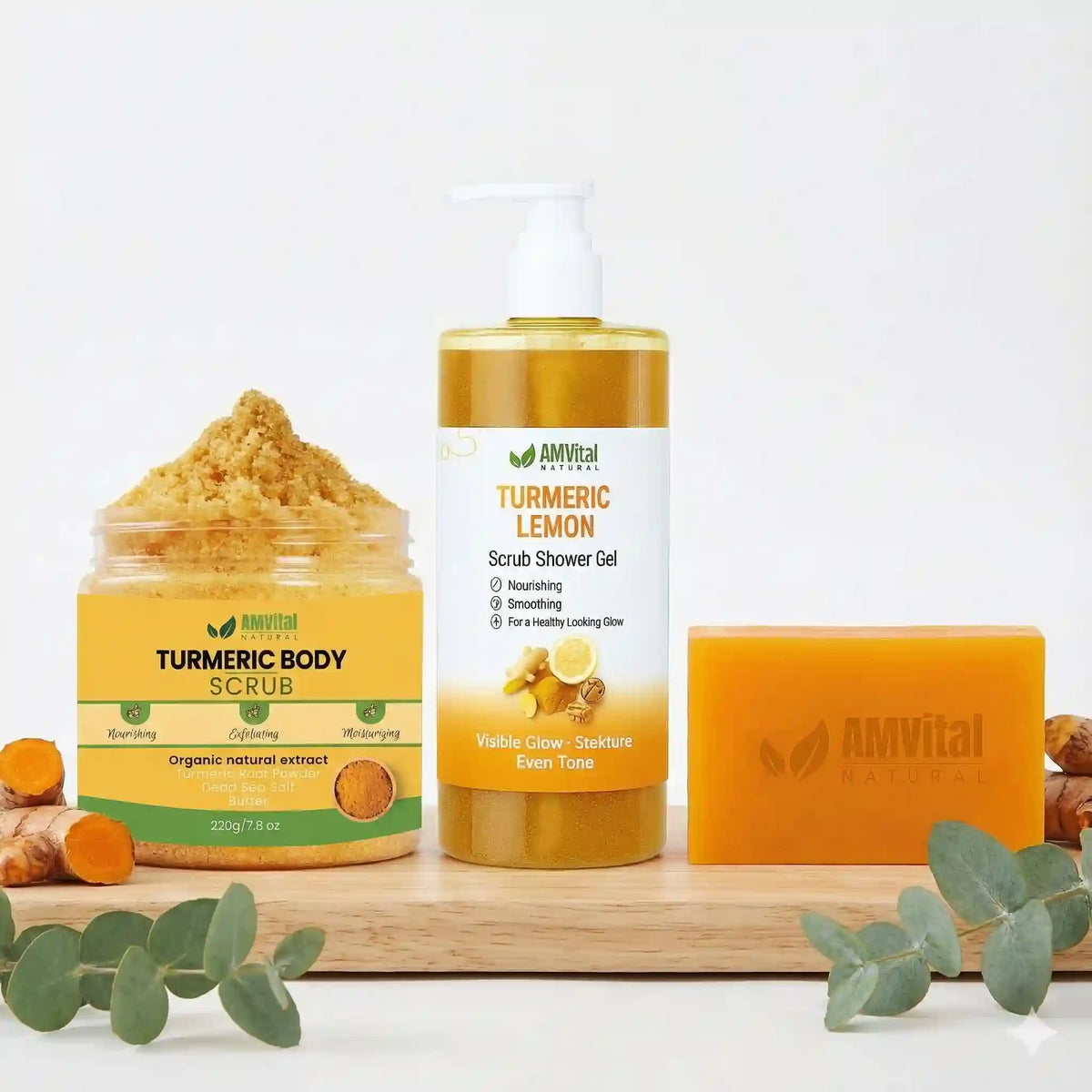 Amvitam Turmeric body scrub, shower gel, and soap on a white background