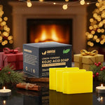 AMVital Lemon-Turmeric Kojic Acid Soap bars with packaging in a festive setting with lights and presents.