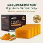 Kojic Acid + Turmeric Soap packaging with soap bars and turmeric powder on a light background