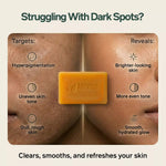 AMVital soap bar on skin with text about its benefits for dark spots and skin issues.