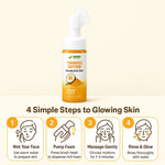 Bottle of Tumeric Saffron Foaming Face Wash with usage instructions on a beige background