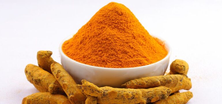 Turmeric in a bowl for brain health.