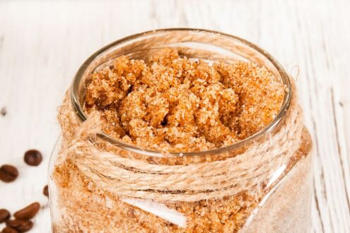 A jar of brown sugar body scrub.