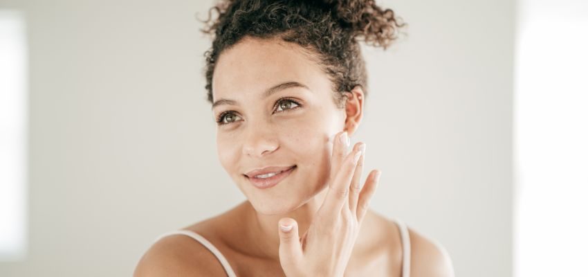 A woman eating sweet foods to get rid of salty taste in mouth.