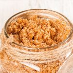 A jar of brown sugar body scrub.