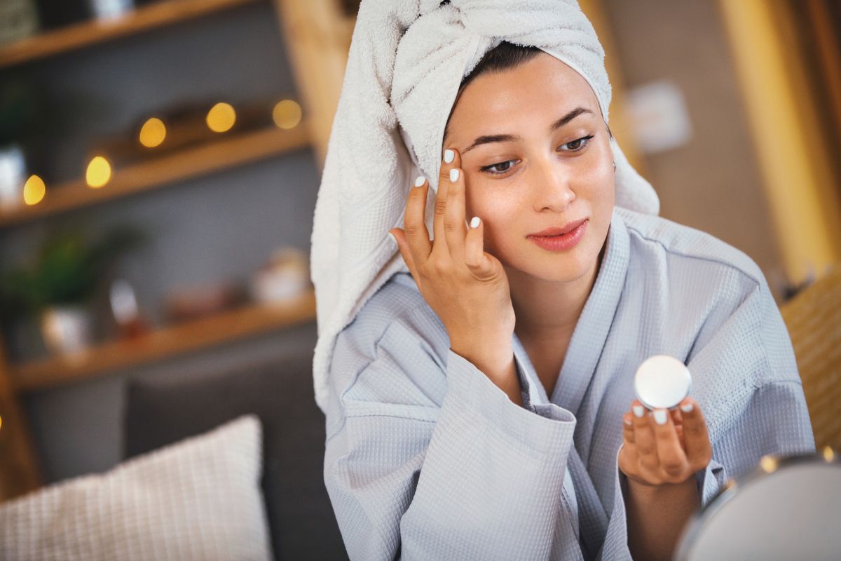 The woman is using an effective skincare from AMVital.