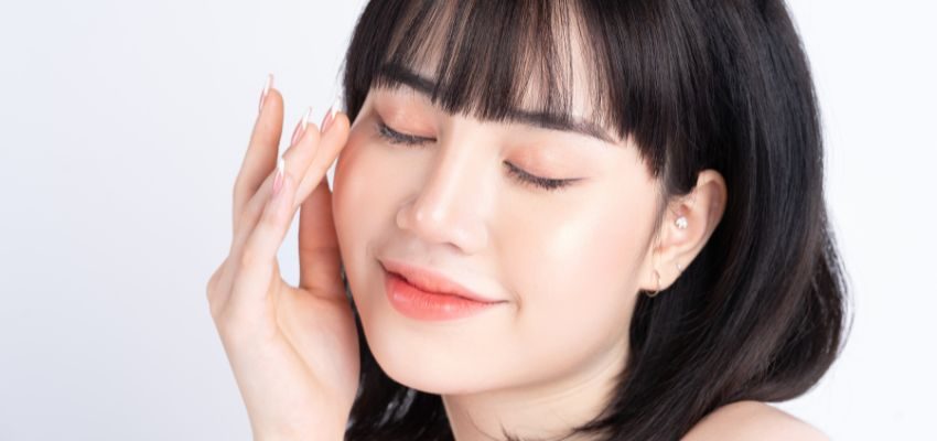 A woman eating sweet foods to get rid of salty taste in mouth.