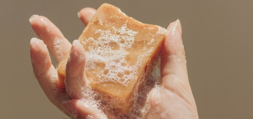 A woman eating sweet foods to get rid of salty taste in mouth.