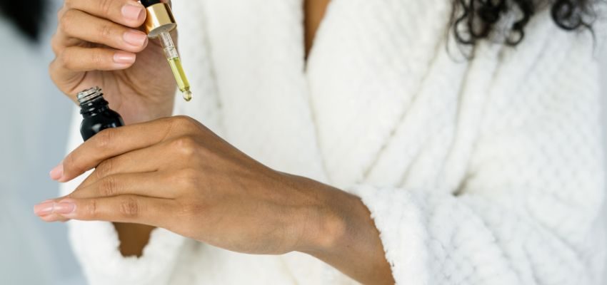 A woman eating sweet foods to get rid of salty taste in mouth.