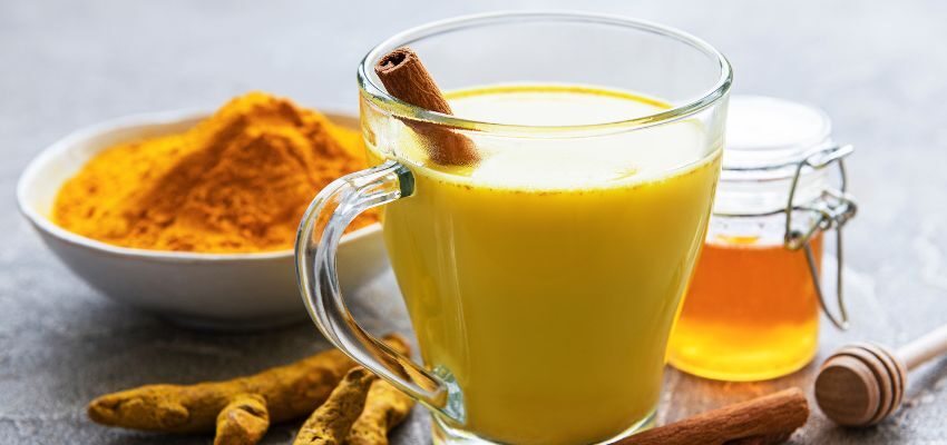 A woman eating sweet foods to get rid of salty taste in mouth.