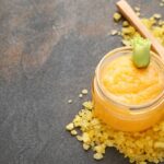 A jar of turmeric body scrub.