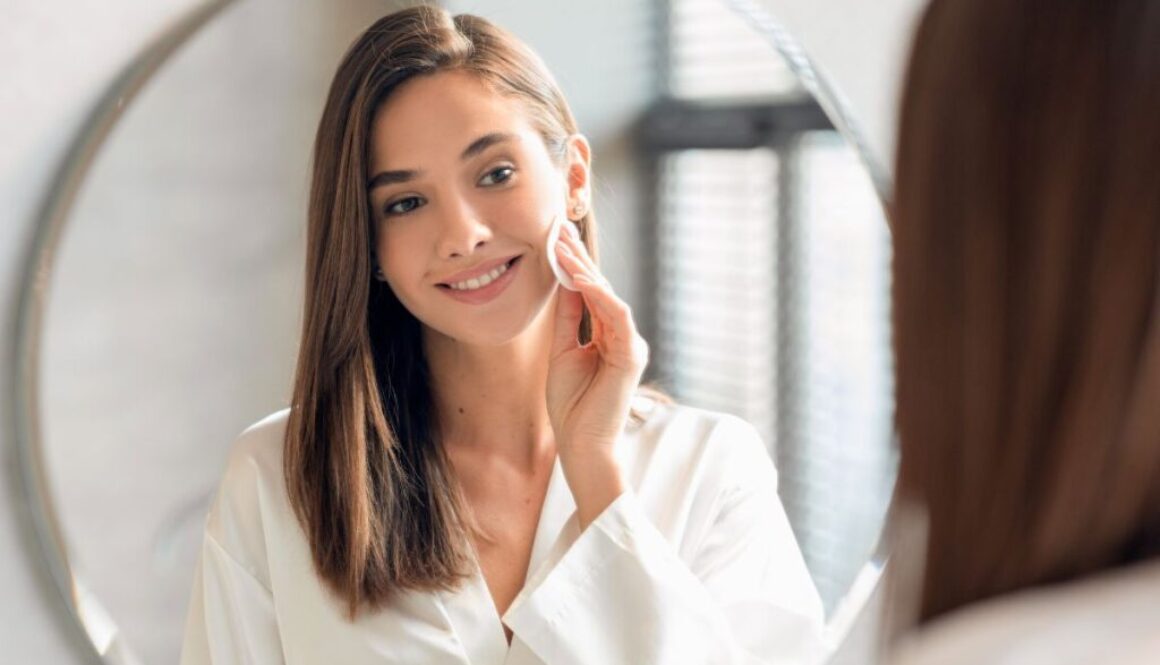 The woman wiped the dirt off her face with turmeric cleansing pads.
